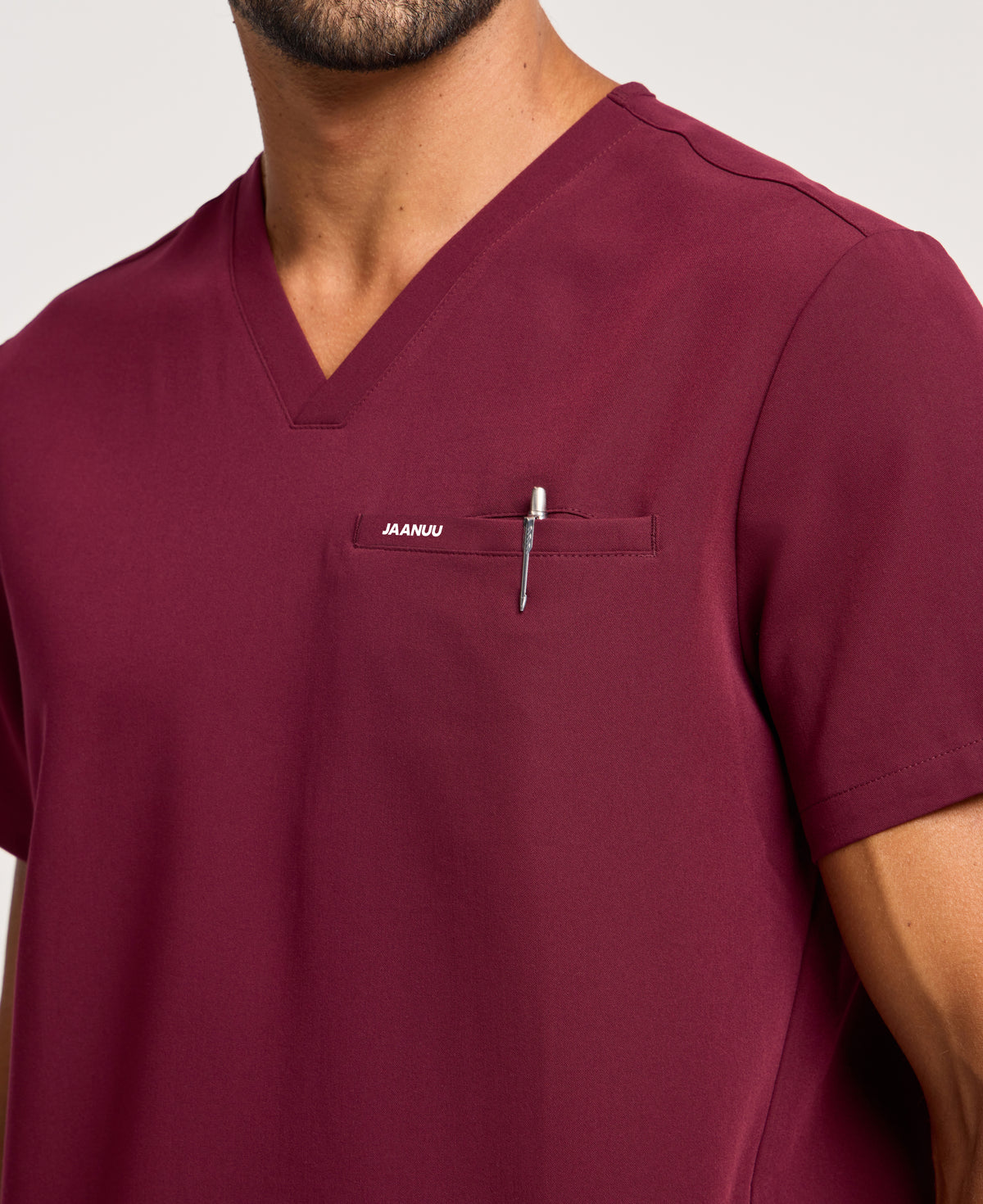 Jaanuu Platt 3-Pocket Scrub Top in Burgundy, product photo 2 of 6