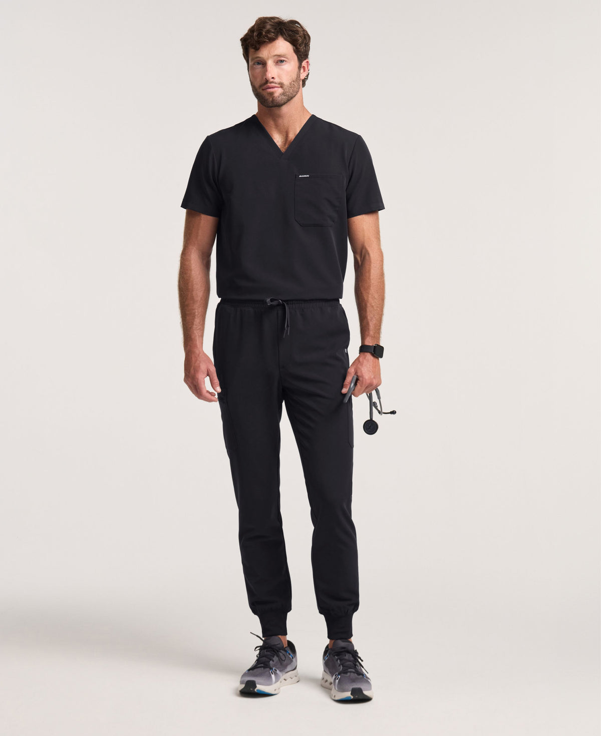 Jaanuu Holmes Slim 1-Pocket Scrub Top in Black, product photo 2 of 6