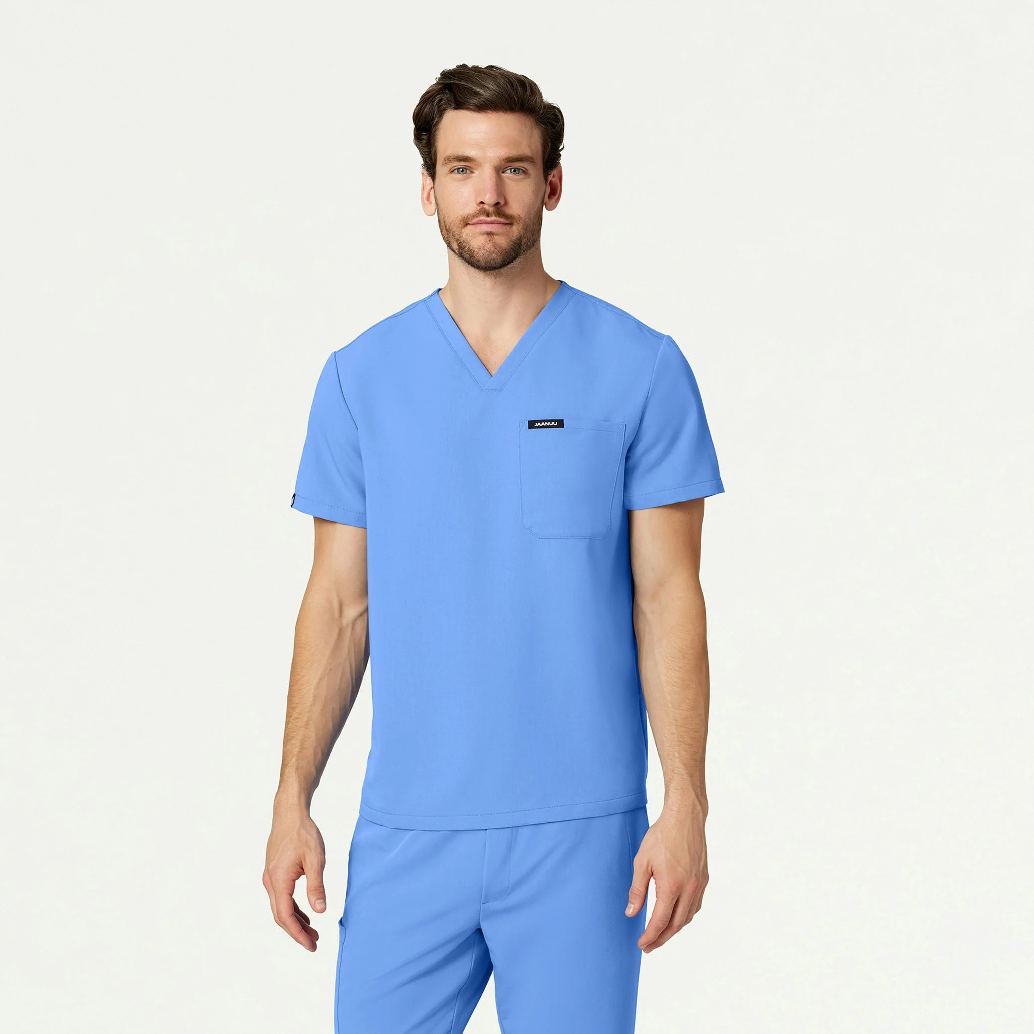 Man wearing Ceil Blue scrub top