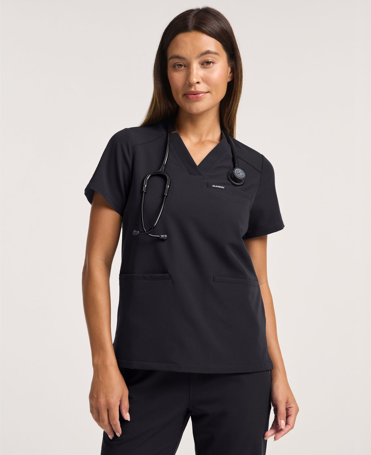 Jaanuu Helia Notched V-Neck Scrub Top in Black, product photo 2 of 6