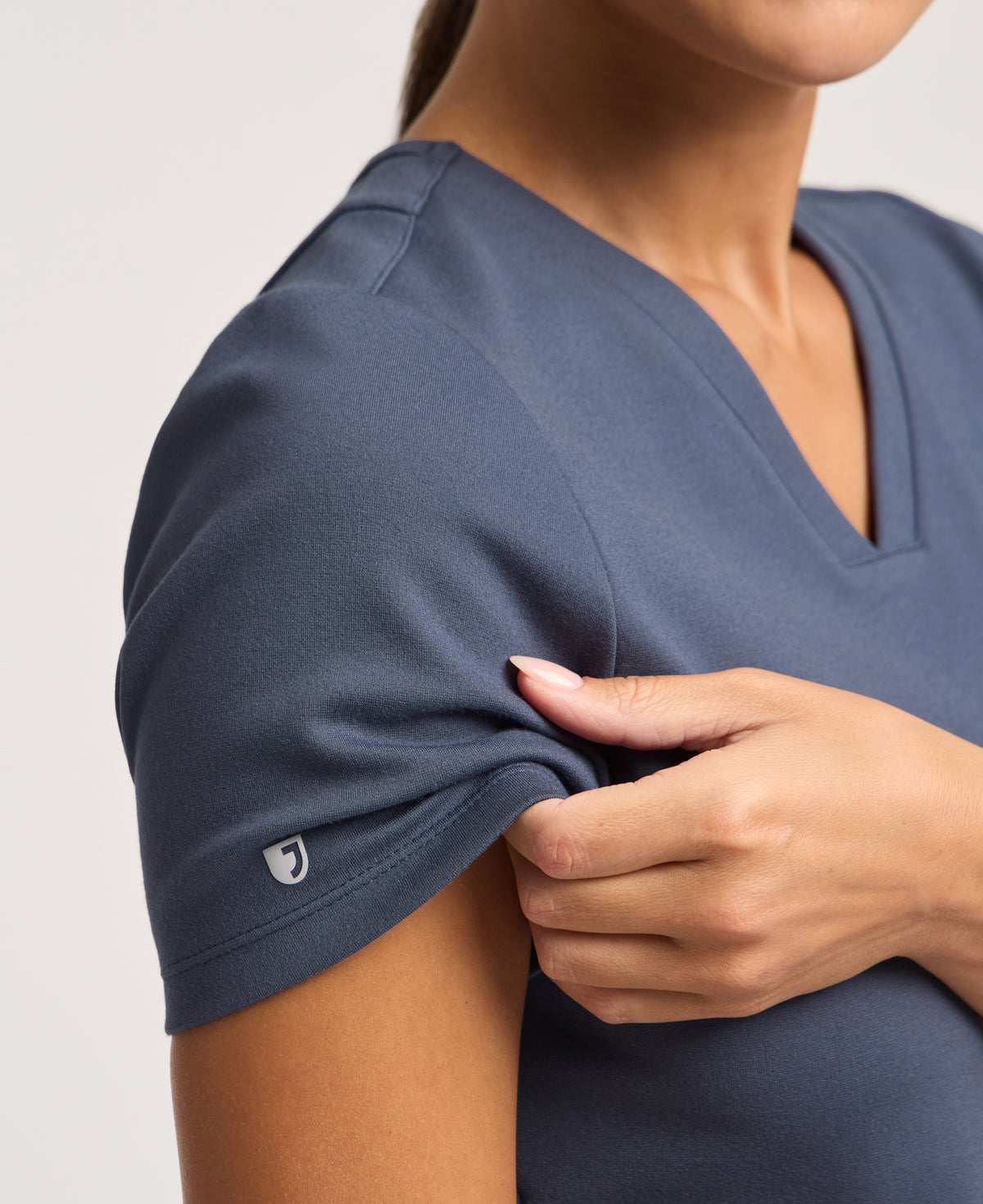 Jaanuu Kass Slim 4-Pocket Scrub Top in Carbon Gray, product photo 2 of 6