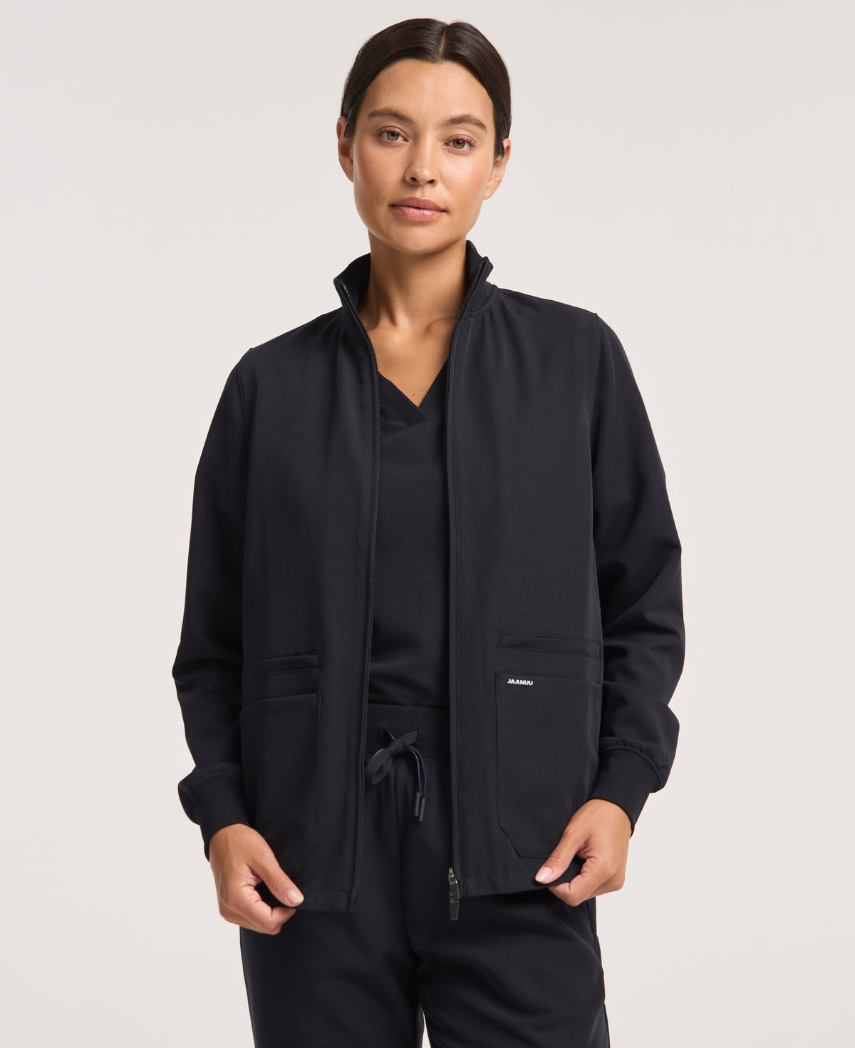 Jaanuu Ceri 6-Pocket Scrub Jacket in Black, product photo 2 of 6