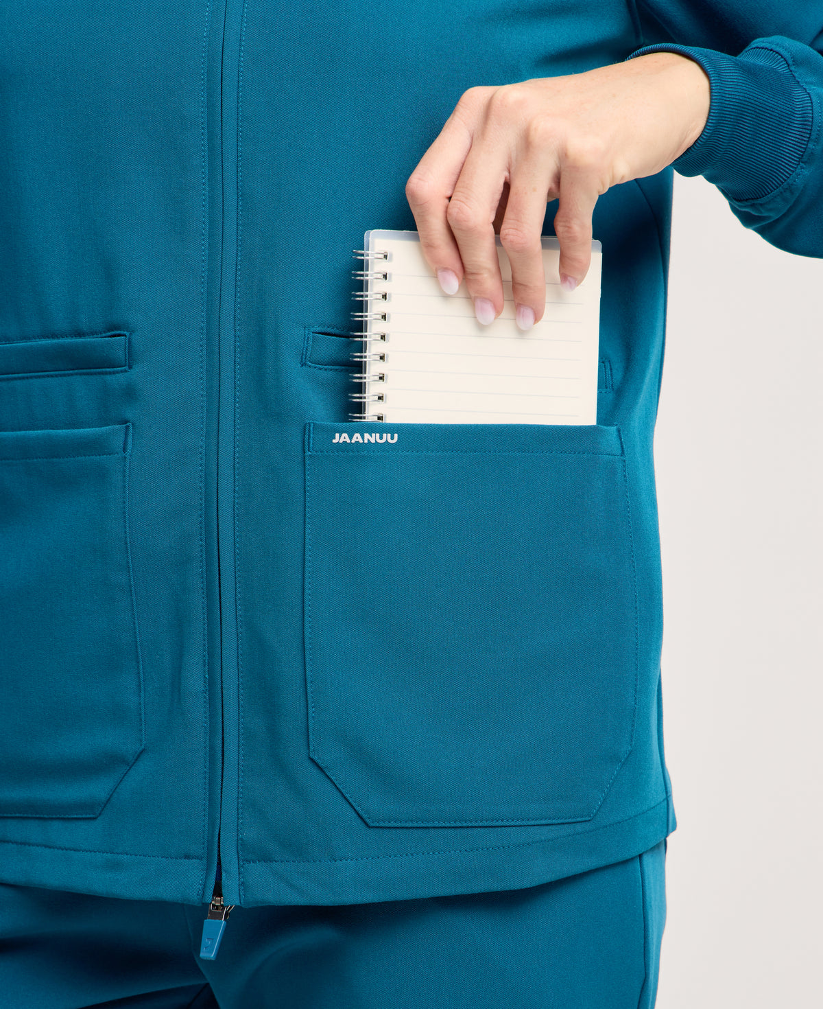 Jaanuu Ceri 6-Pocket Scrub Jacket in Caribbean Blue, product photo 6 of 6