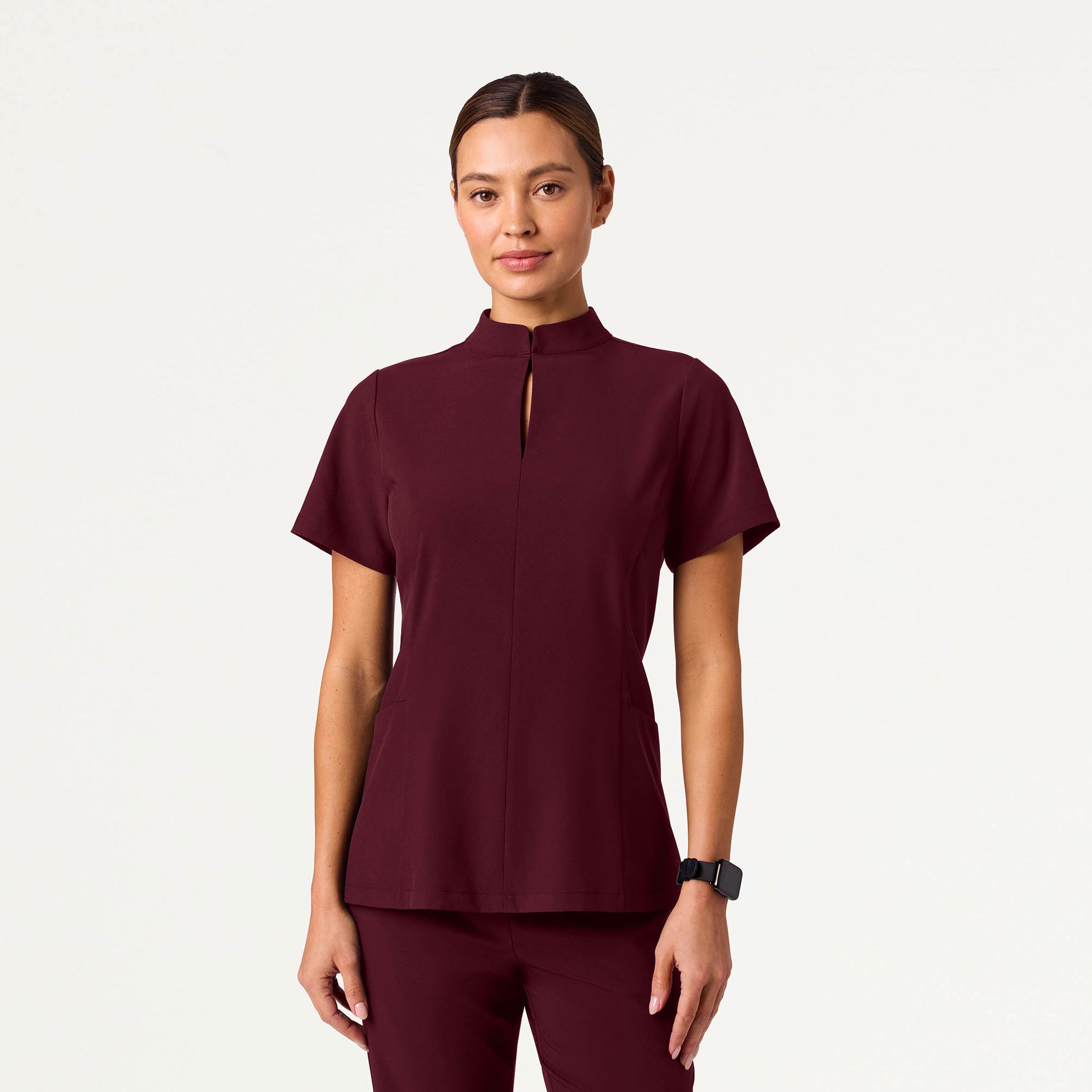 Woman wearing Burgundy scrubs