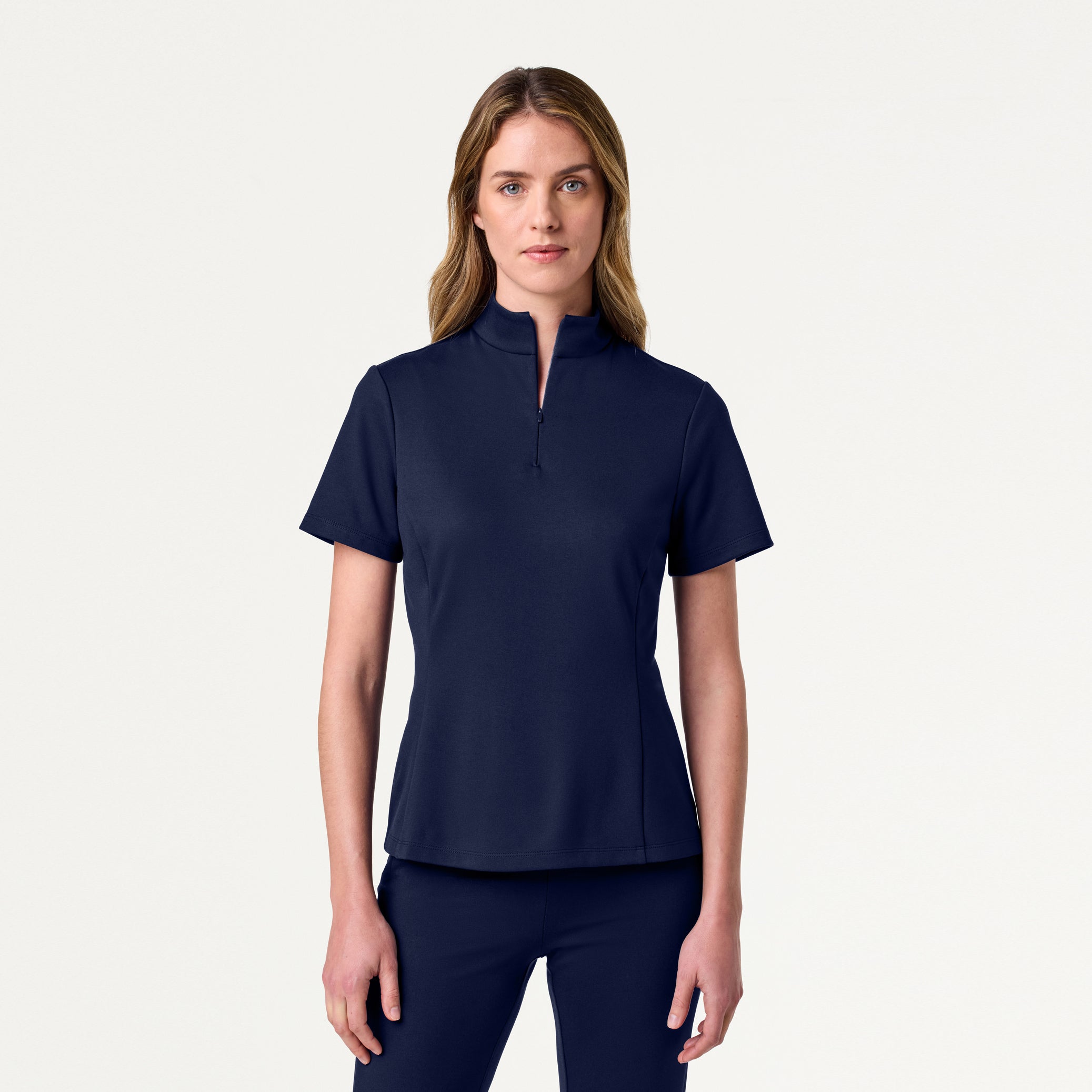 Woman in midnight navy scrub set