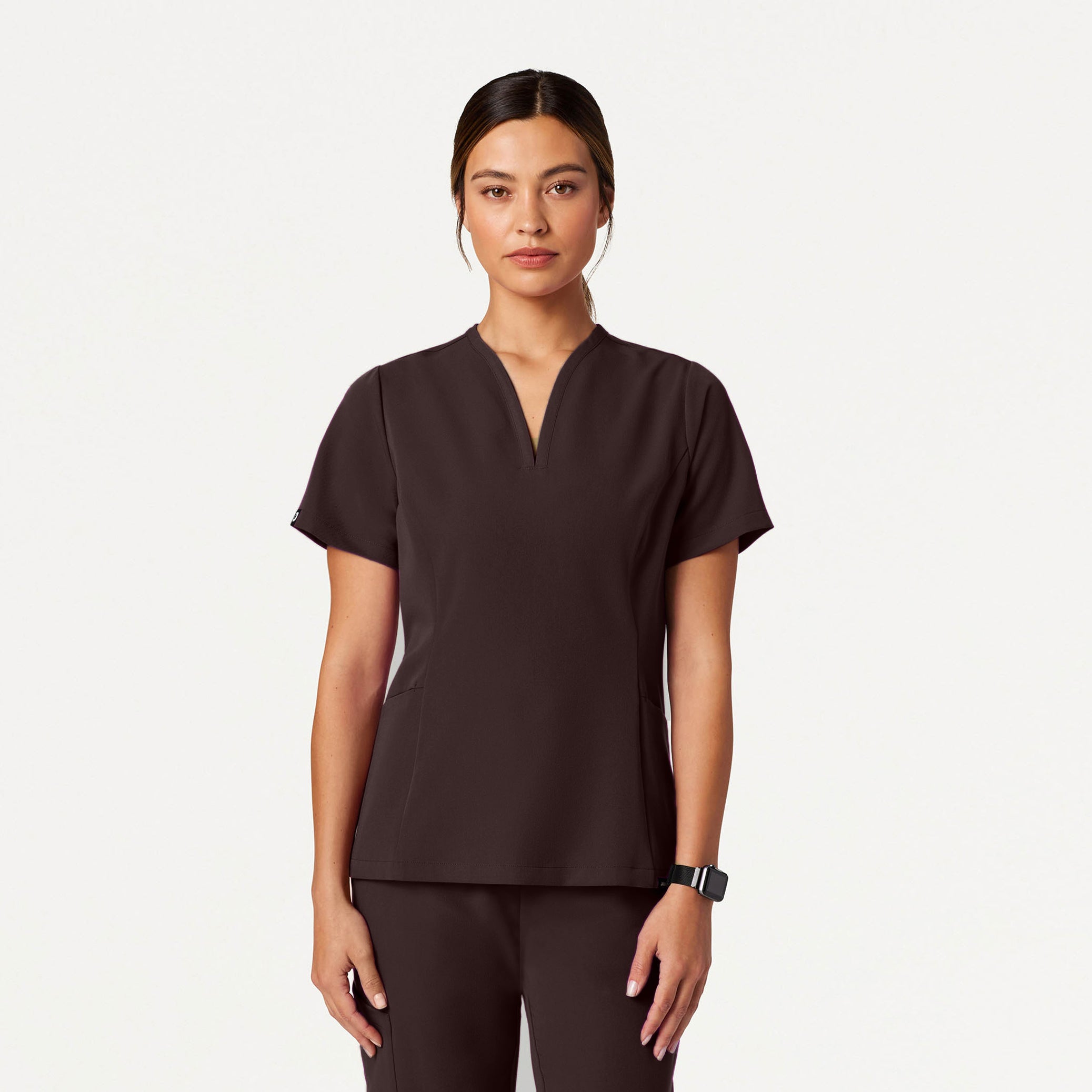 Woman wearing an Espresso scrub top