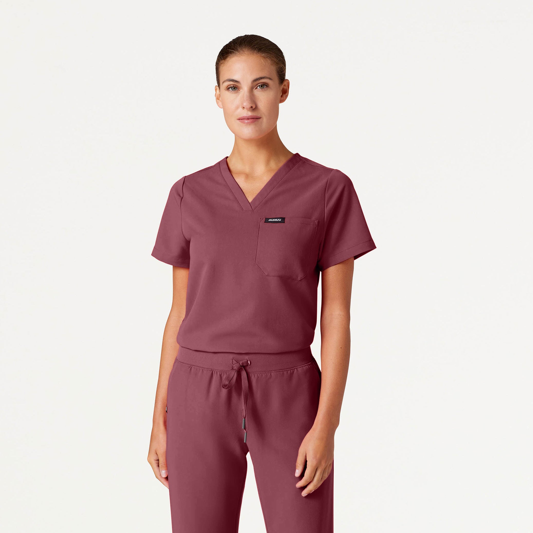Woman wearing Rosewood scrubs
