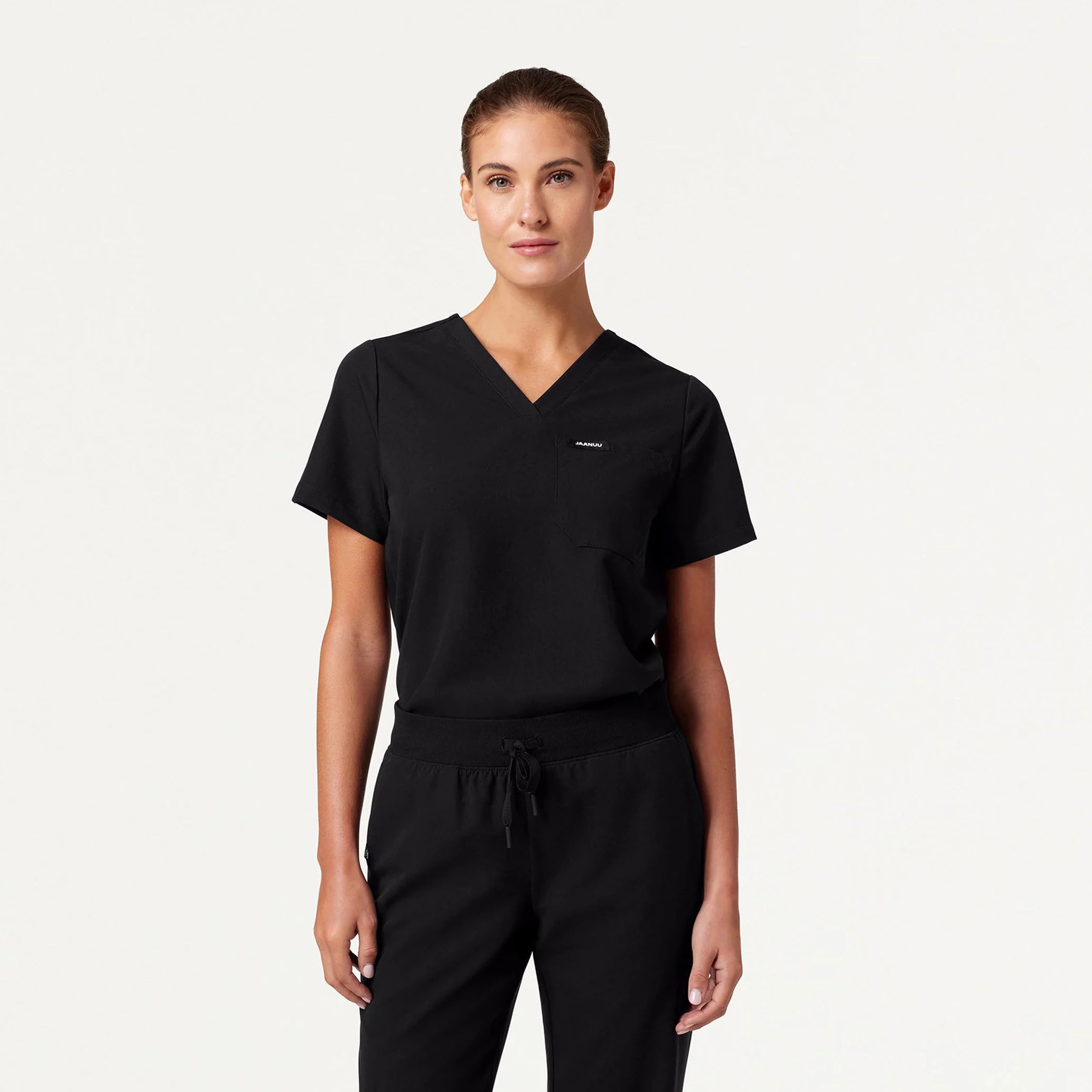 Woman wearing black scrub top