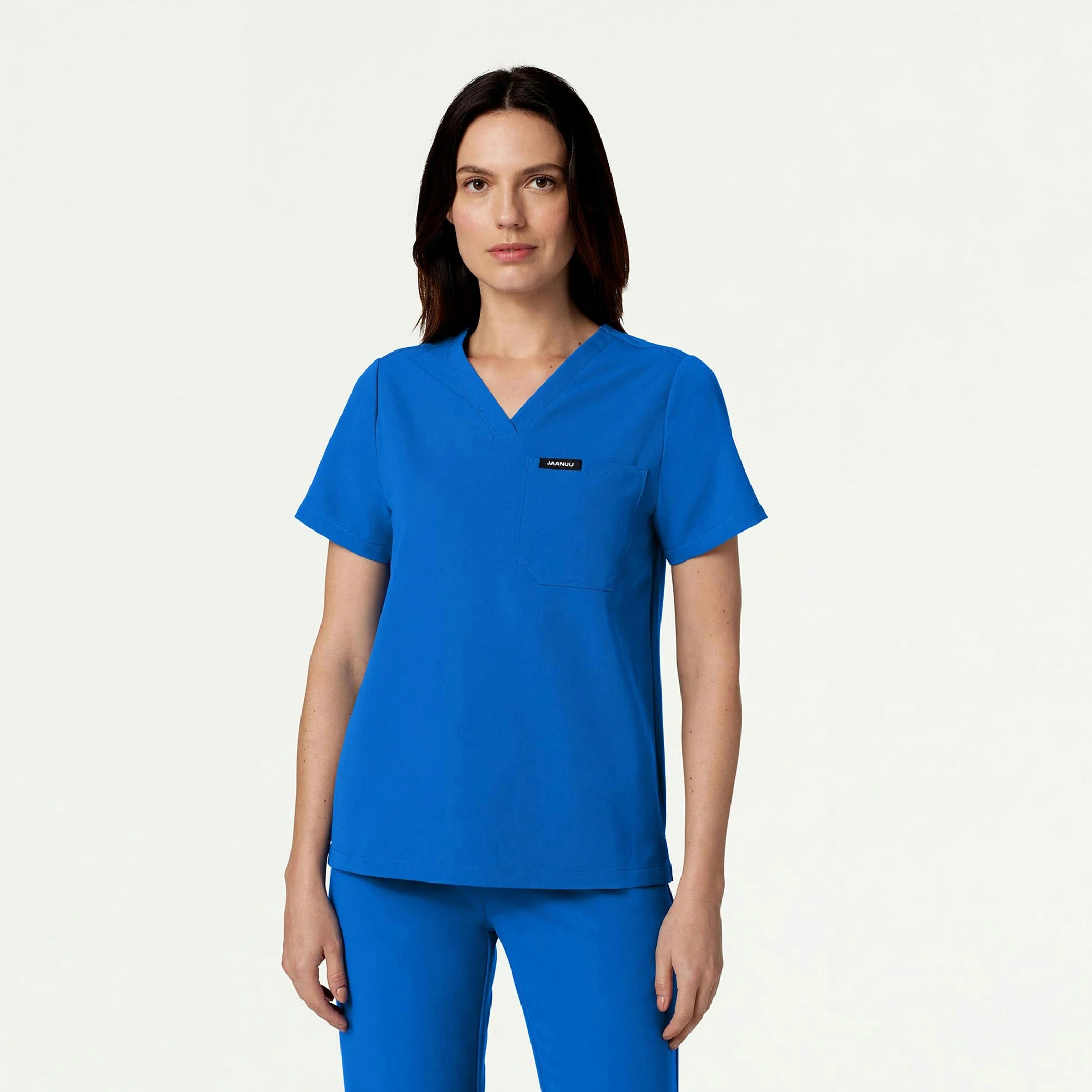 Woman in royal blue scrub top