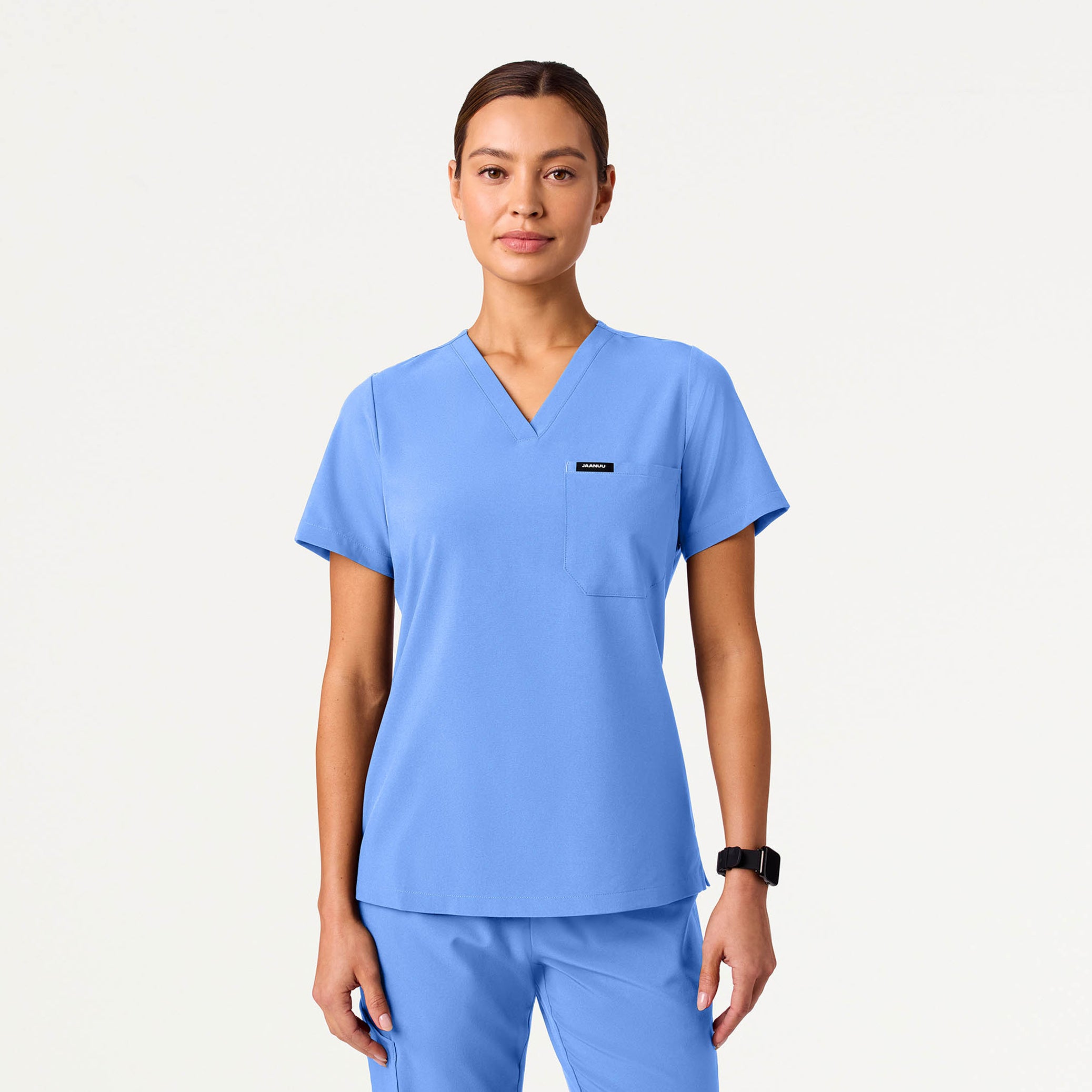 Woman wearing Ceil Blue scrubs