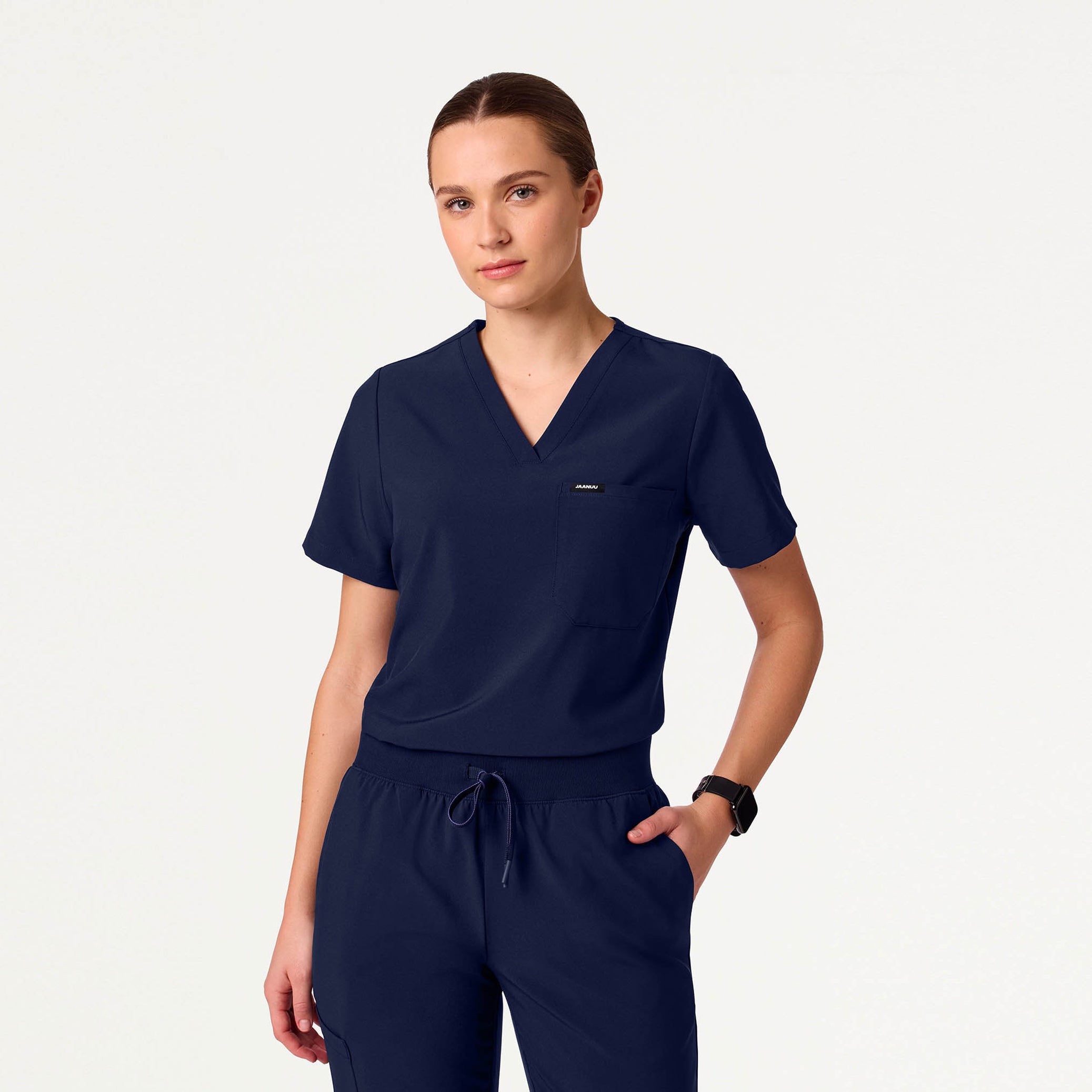 Woman wearing navy scrub top
