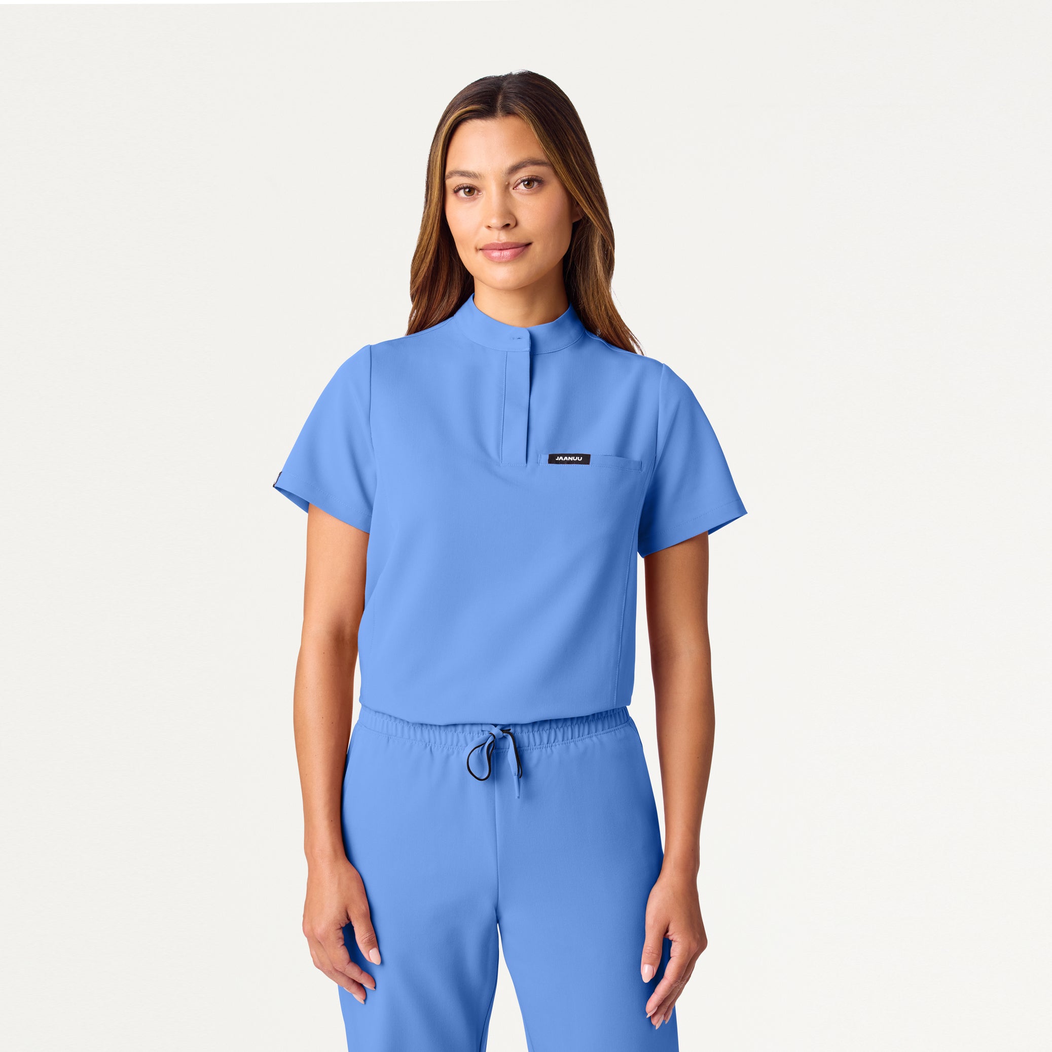 Woman wearing Ceil Blue scrub top