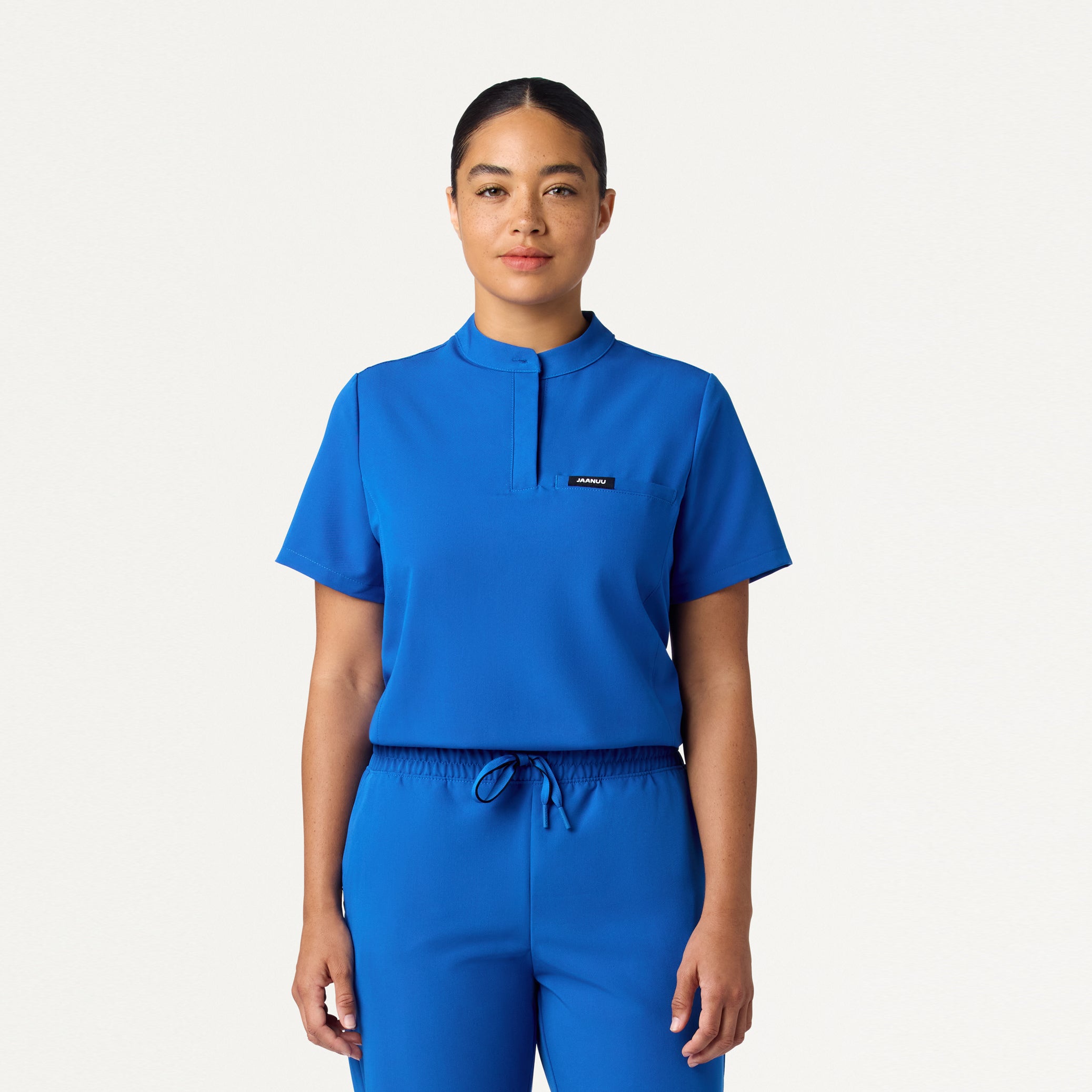 Woman wearing Royal Blue scrub top