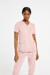 Woman with baby pink scrub