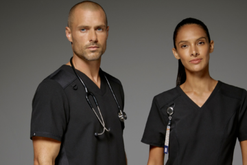 Man and woman with black scrubs