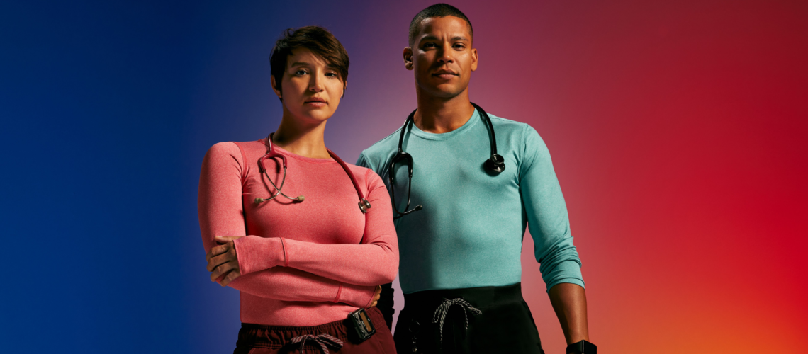 Man and woman with colorful scrubs