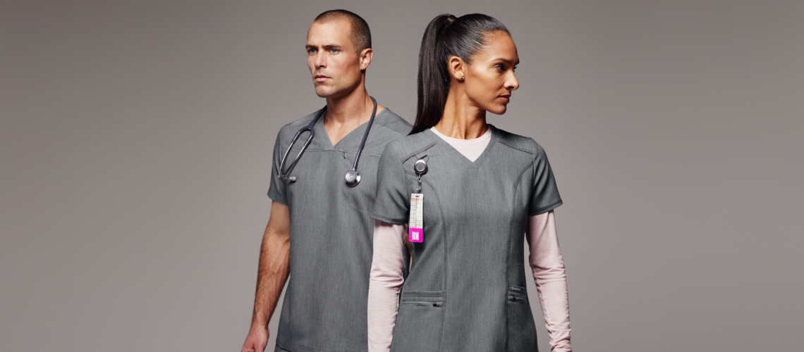 Man and woman with grey scrubs