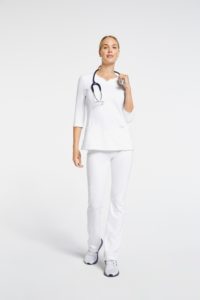 Woman wearing white scrubs