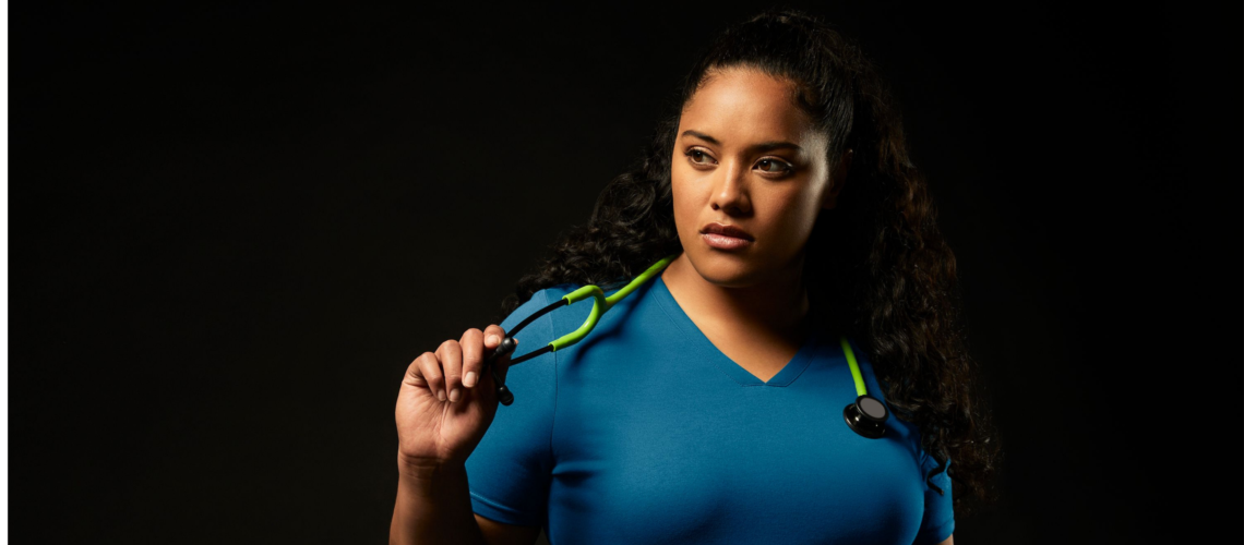 woman with scrubs and black background