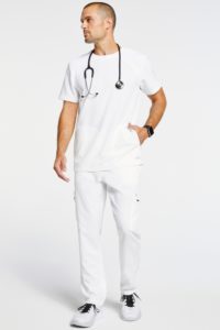 Full body image of man wearing white scrubs