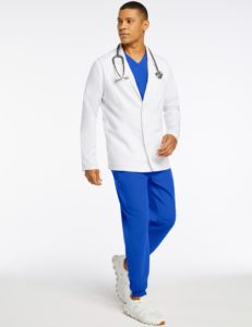 Man in white lab coat and blue scrubs