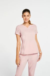 Woman with baby pink scrub