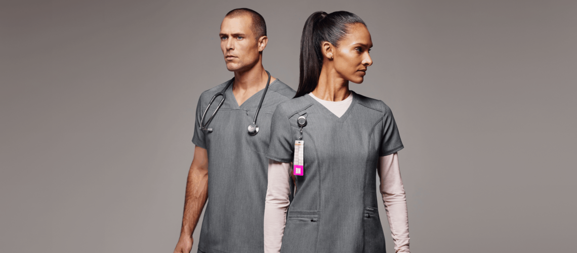 man and woman wearing gray scrubs