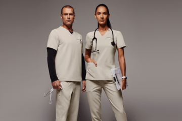 Man and woman wearing light color scrubs