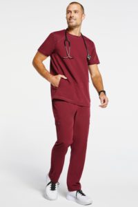 Man wearing raglan sleeve top scrubs in wine