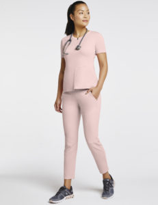 Woman wearing yoga pant scrubs in pink