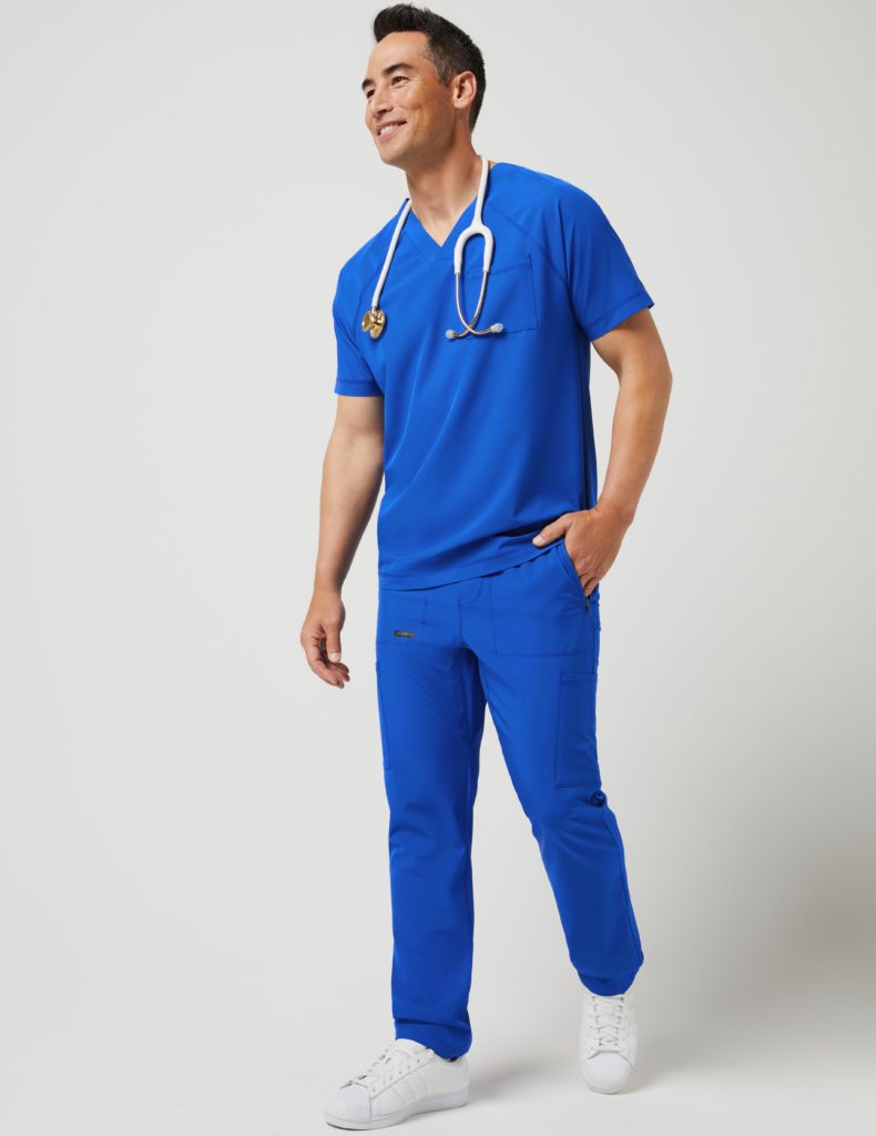 Nurse wearing straight leg utility cargo pant royal blue scrubs