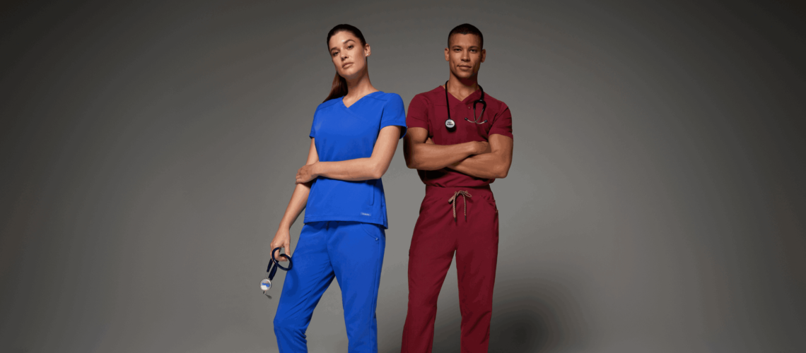 couple of nurses wearing two piece scrubs