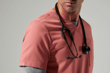 doctor wearing pink v neck scrubs