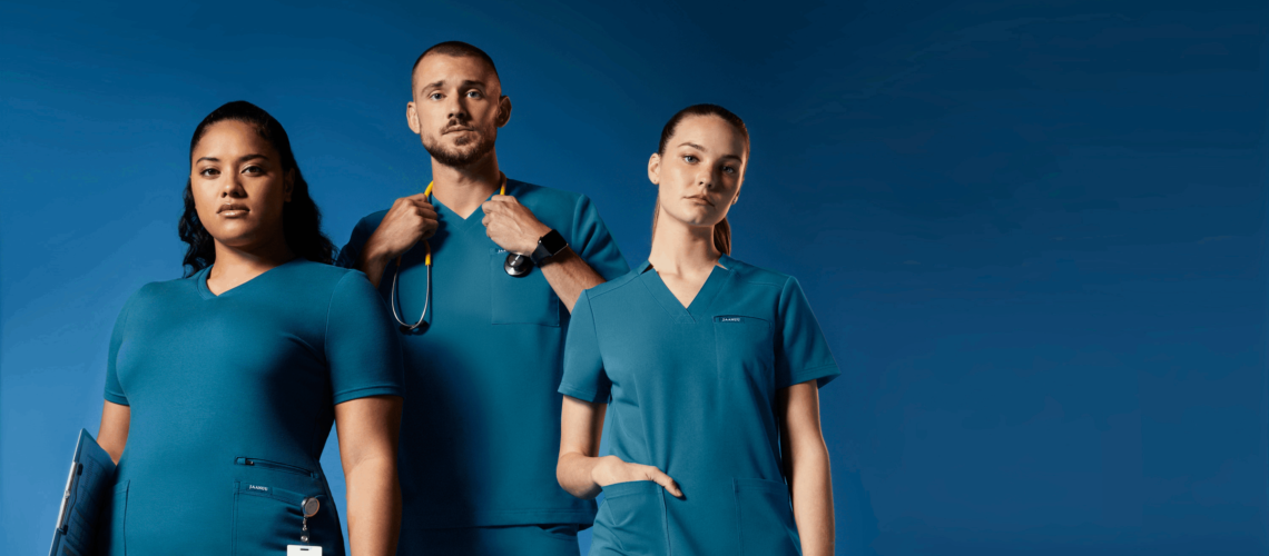 group of doctors wearing blue scrubs