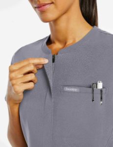 nurse wearing 3 pocket grey scrubs