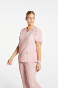 nurse wearing pink 4 pocket scrubs