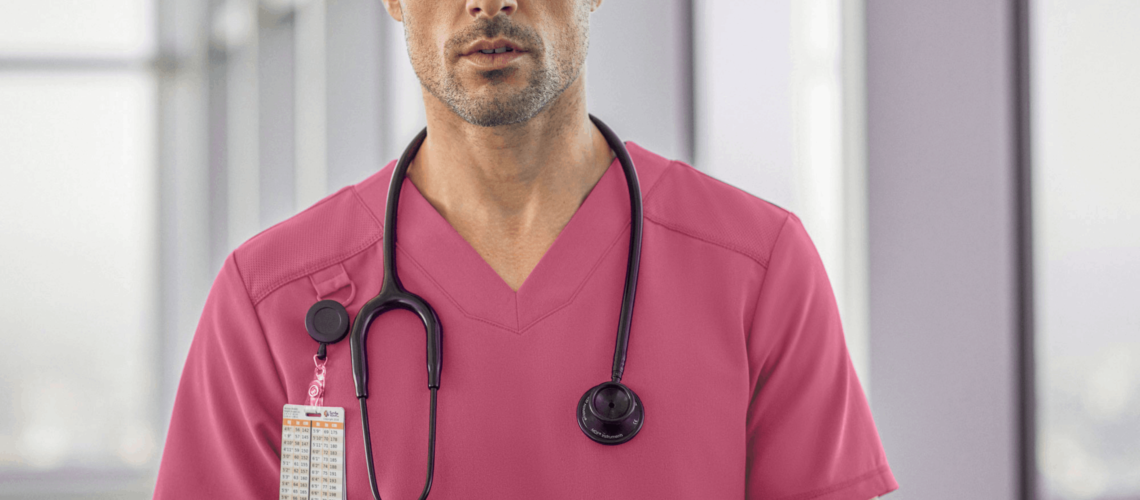 nurse wearing pink paneled v neck