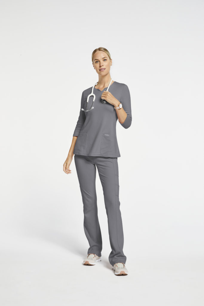 woman wearing grey sleeve top scrubs