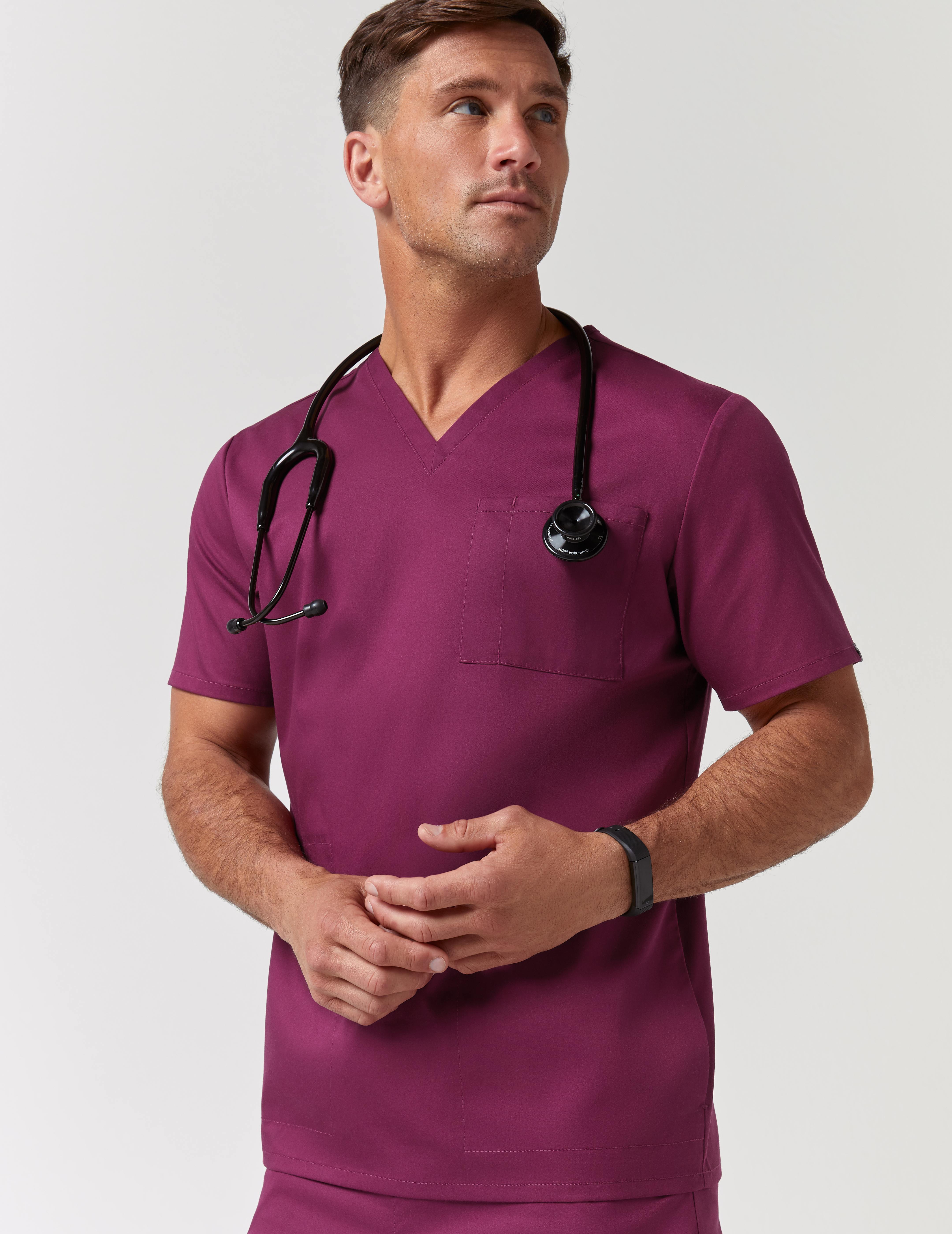 Man wearing v-neck 3 pocket top scrubs