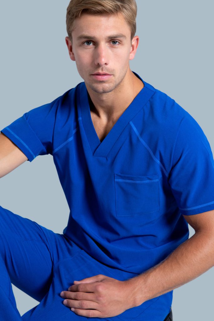 Man wearing v neck raglan top blue scrubs