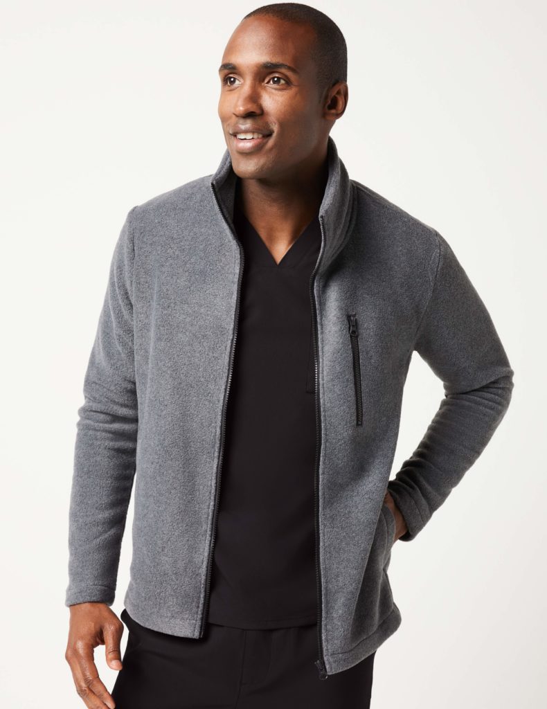 Man wearing zip-up fleece charcoal jaanuu jacket