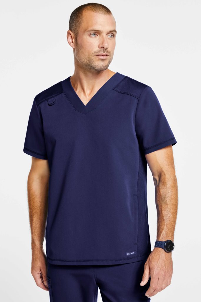 Nurse wearing paneled-mesh v-neck top navy scrubs