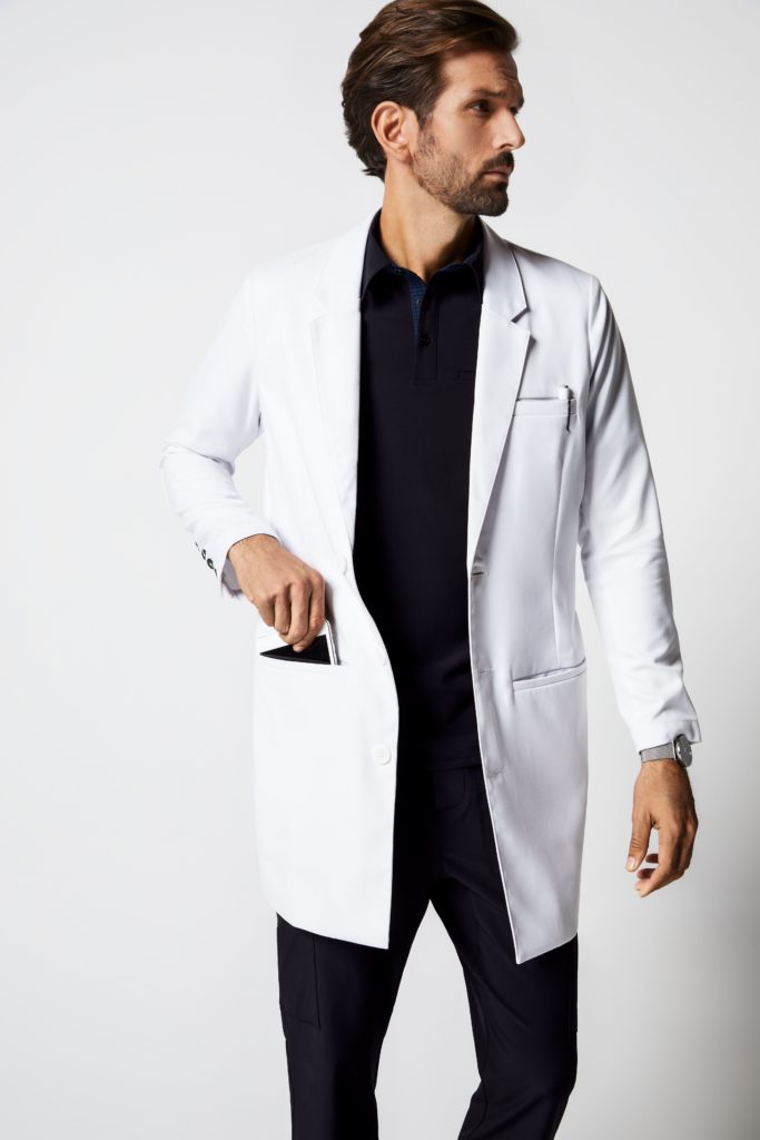 Man wearing white jaanuu lab coat