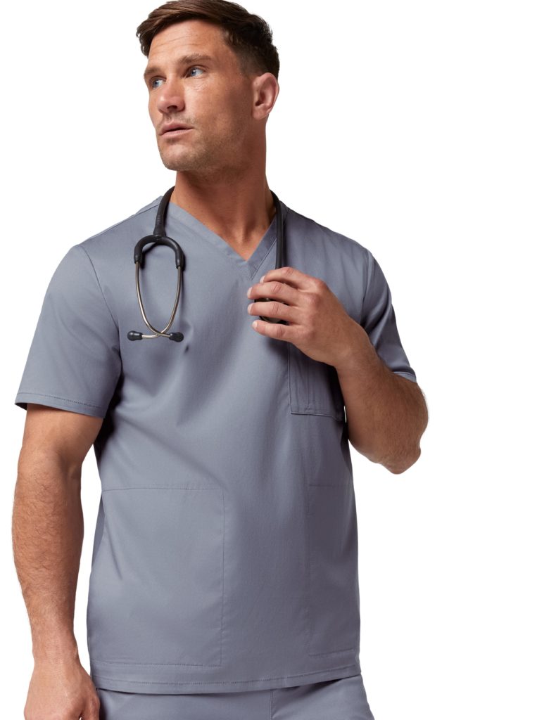 Nurse wearing v-neck three pocket top scrubs in gray