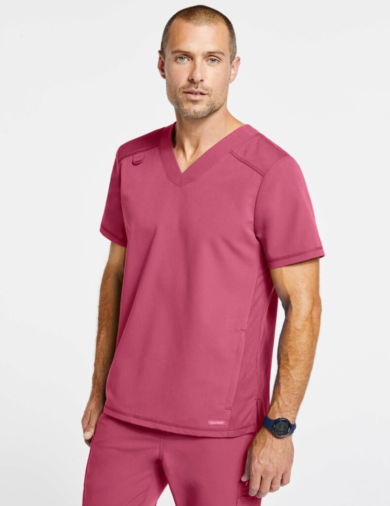Medical student wearing pink scrub top and pants