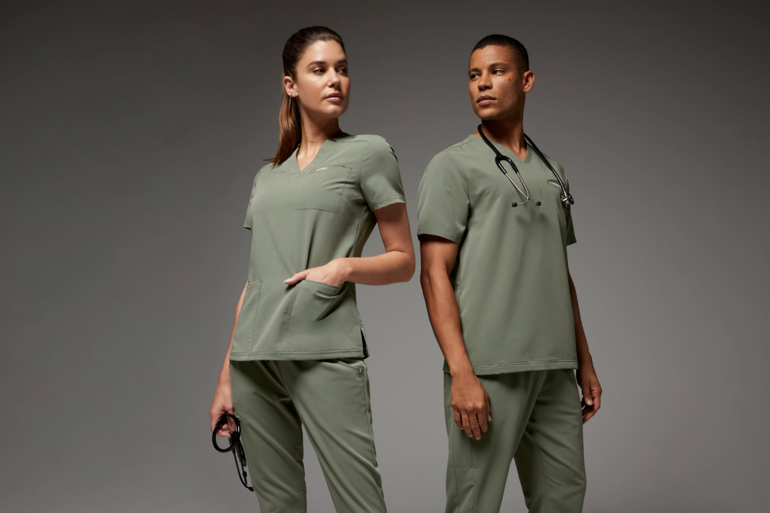 couple-of-nurses-wearing-light-green-uniform