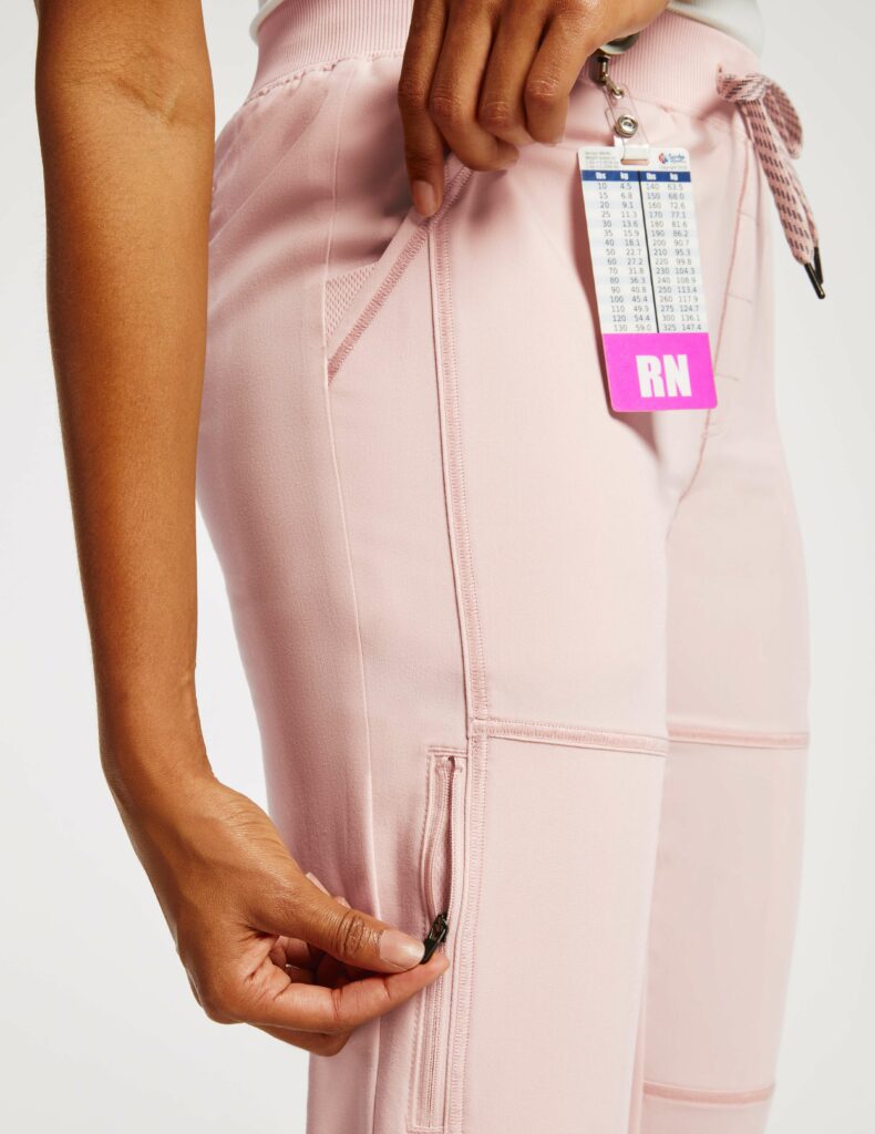 Nurse pink jogger pants with nurse badge hanging