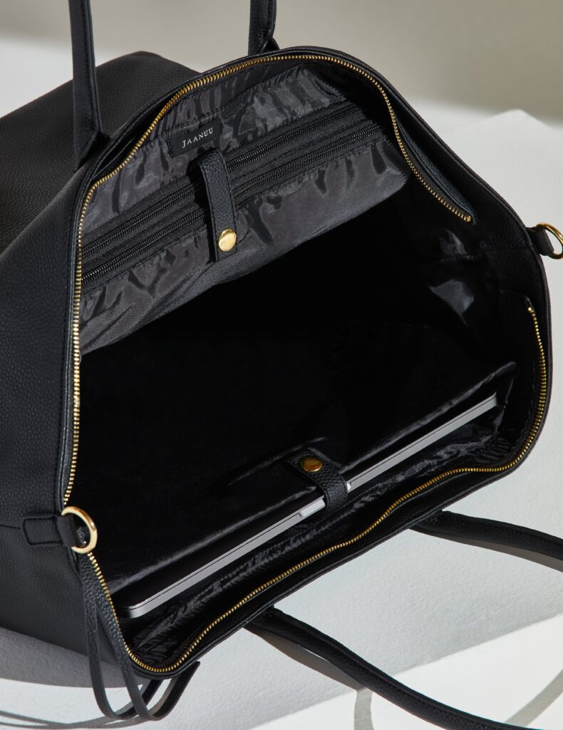 notebook-in-black-flat-backpack