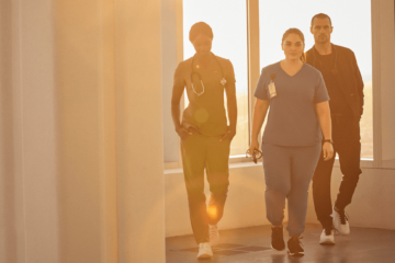 nurses-walking-in-scrubs-in-a-sunlit-room