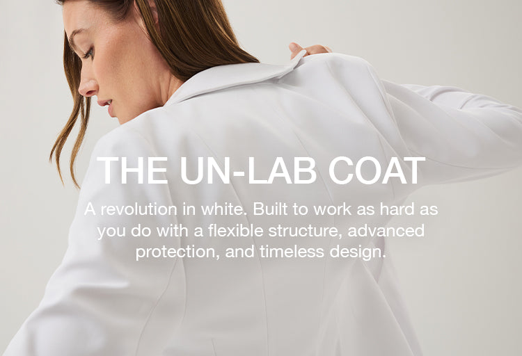 A women wearing white scrubs with her back turned and a text overlay that says "A revolution in white. Built to work as hard as you do with a flexible structure, advanced protection, and timeliness design."